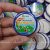 Quà Tặng Doanh Nghiệp Huy Hiệu In Logo Cho Công Ty Hương Thủy